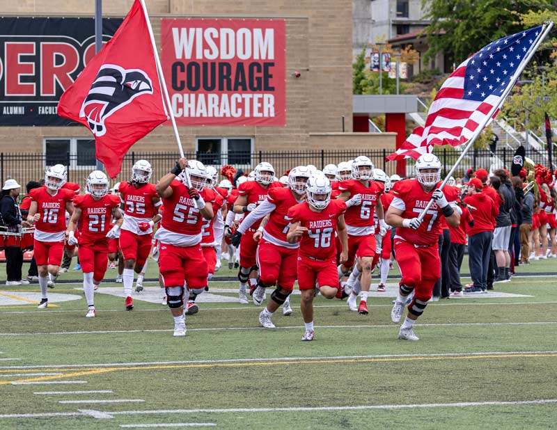SOU Football team taking the field